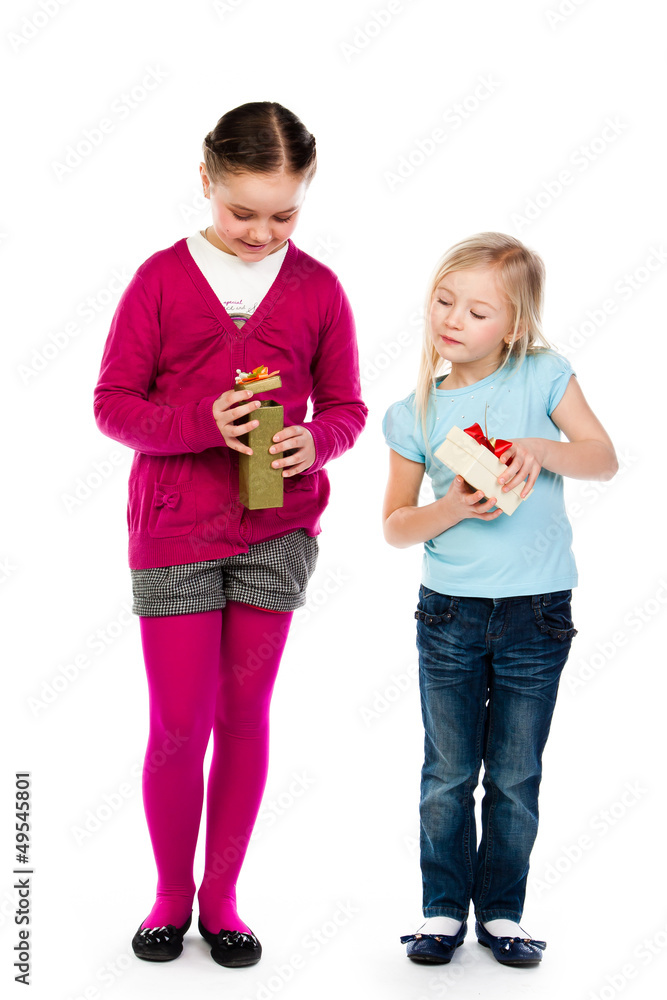 two beautiful little girl with gifts
