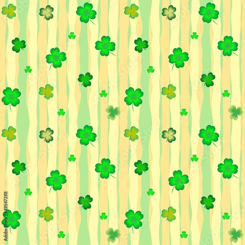 Seamless background with leaves of shamrock