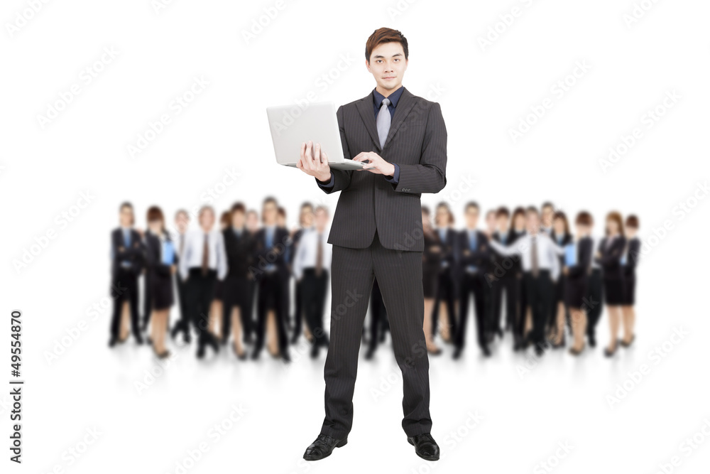 smart businessman holding laptop and successful business team smart businessman holding laptop and successful business team