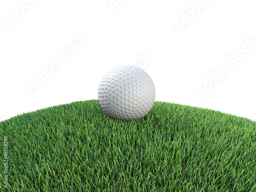 Golf ball sits on grass mound