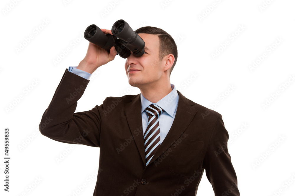 Closeup of a young business man looking through binocular isolat Closeup of a young business man looking through binocular isolat