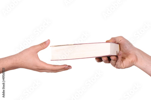 hand holds the bible