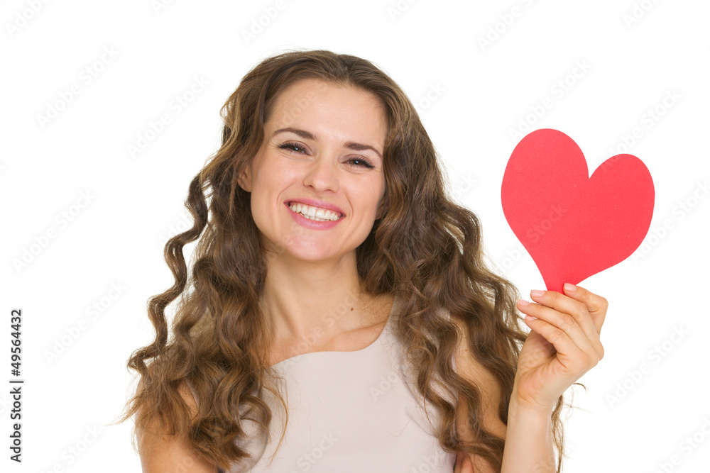 Smiling young woman showing valentine's day cards Smiling young woman showing valentine's day cards