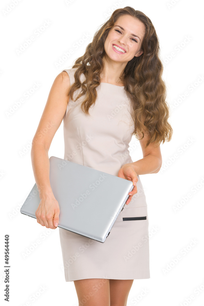 Portrait of smiling young woman with laptop Portrait of smiling young woman with laptop