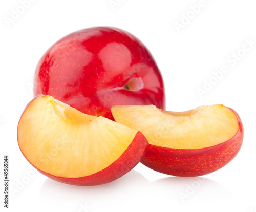 red plums isolated on white