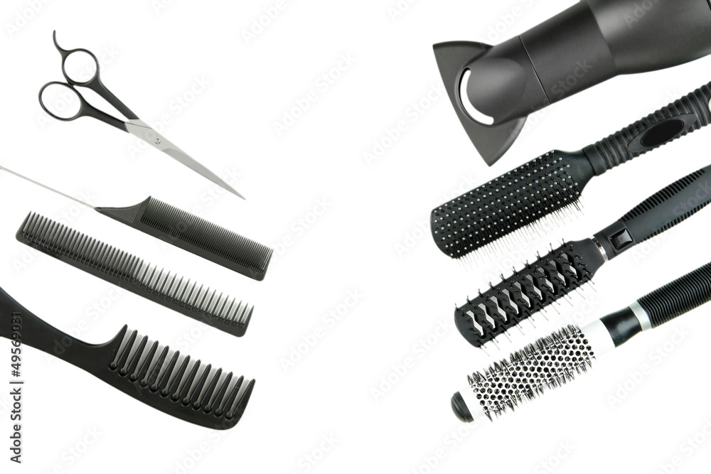 Comb brushes, hairdryer and cutting shears, isolated on white Comb brushes, hairdryer and cutting shears, isolated on white