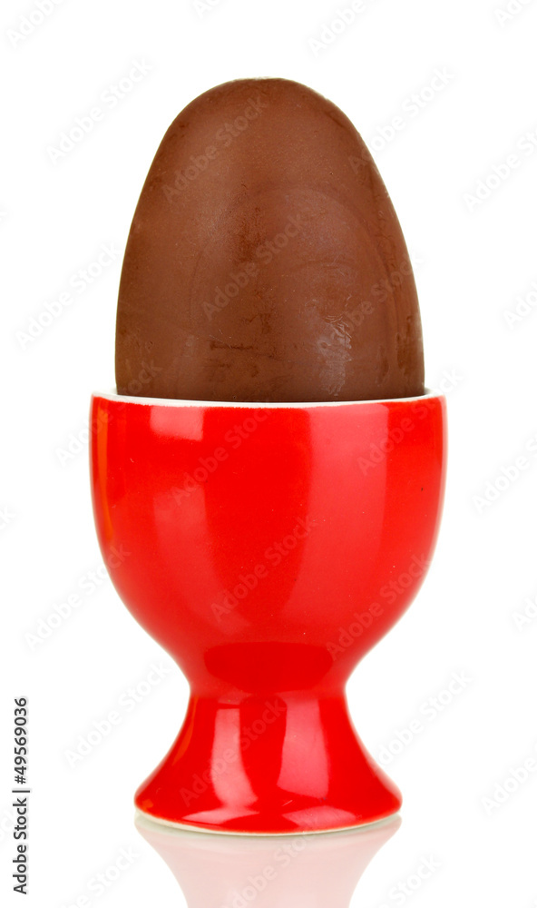 Chocolate egg in stand isolated on white Chocolate egg in stand isolated on white