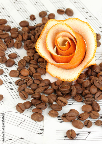 Decorative rose from dry orange peel with coffee beans