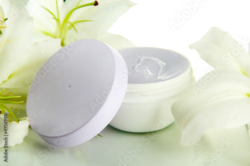 Fototapeta Naklejka Na Ścianę i Meble -  Cosmetic cream and beautiful lily, isolated on white