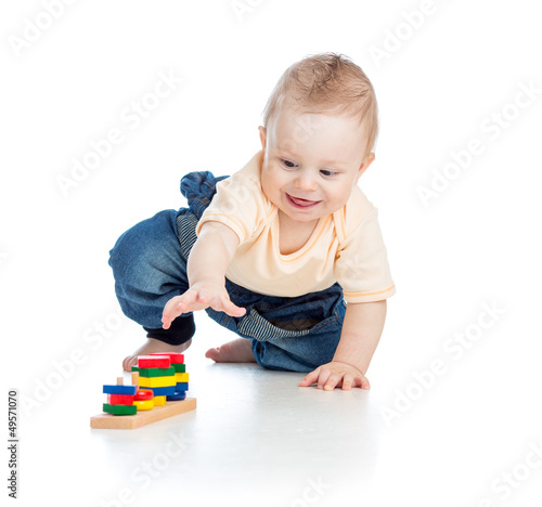 little child playing with b...