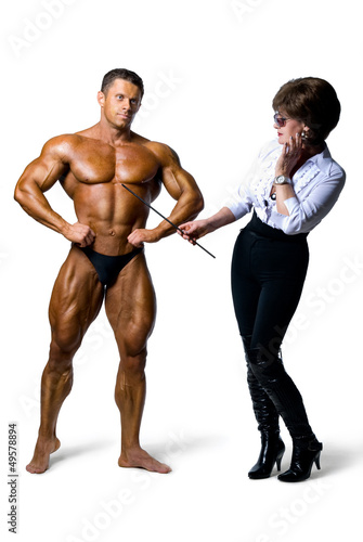 Beautiful woman studying male body muscular men