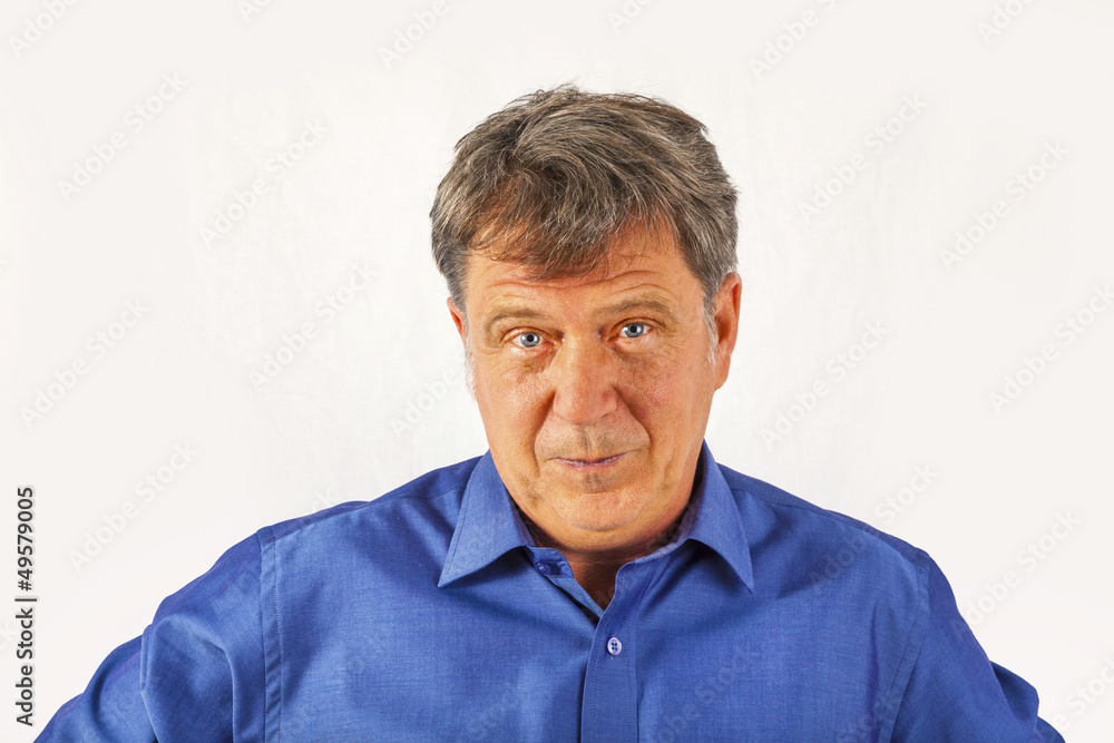 Portrait of a confident senior man standing on white background Portrait of a confident senior man standing on white background