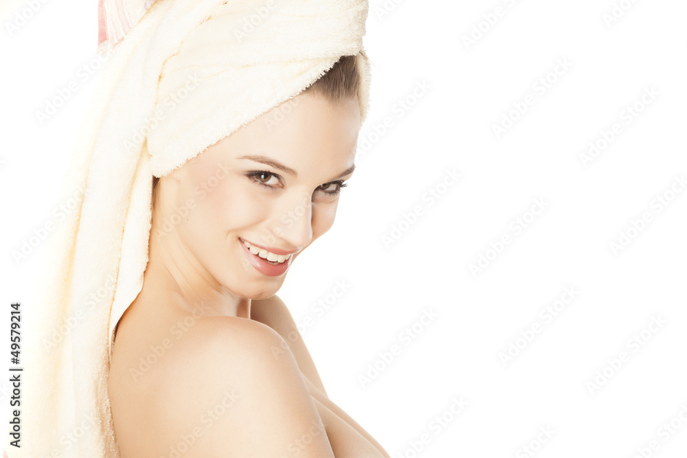 beautiful smiling young woman with a towel on her head beautiful smiling young woman with a towel on her head