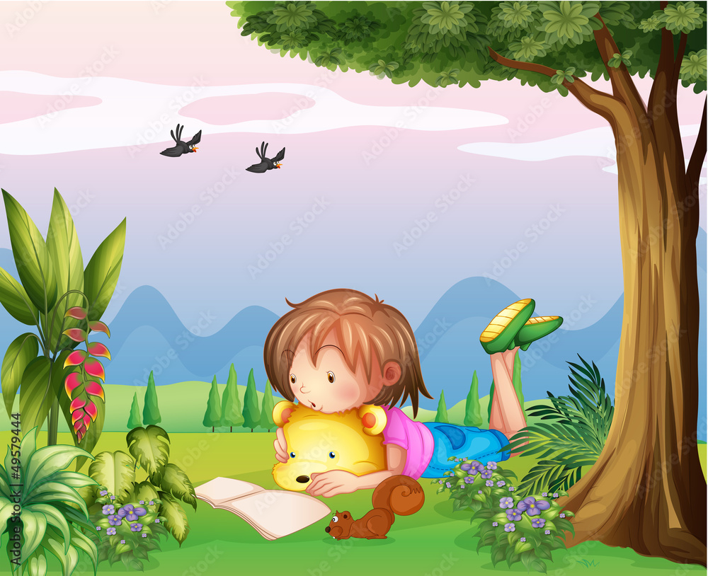 A girl reading at the park A girl reading at the park