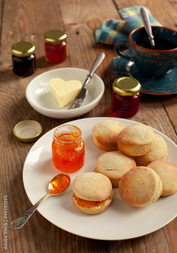 Home-baked scones tea with jam and butter Home-baked scones tea with jam and butter