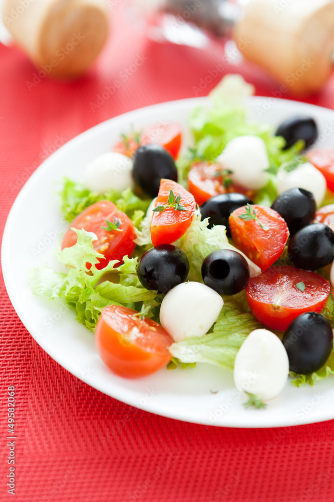 tomato salad with mozzarella and olives