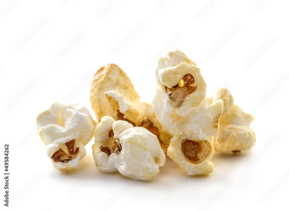handful of popcorn on a white background. handful of popcorn on a white background.