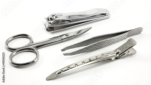 Personal care kit.  Scissors  tweezers  nail clippers  clip.