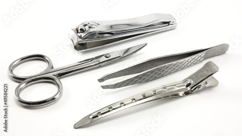 Personal care kit.  Scissors, tweezers, nail clippers, clip.