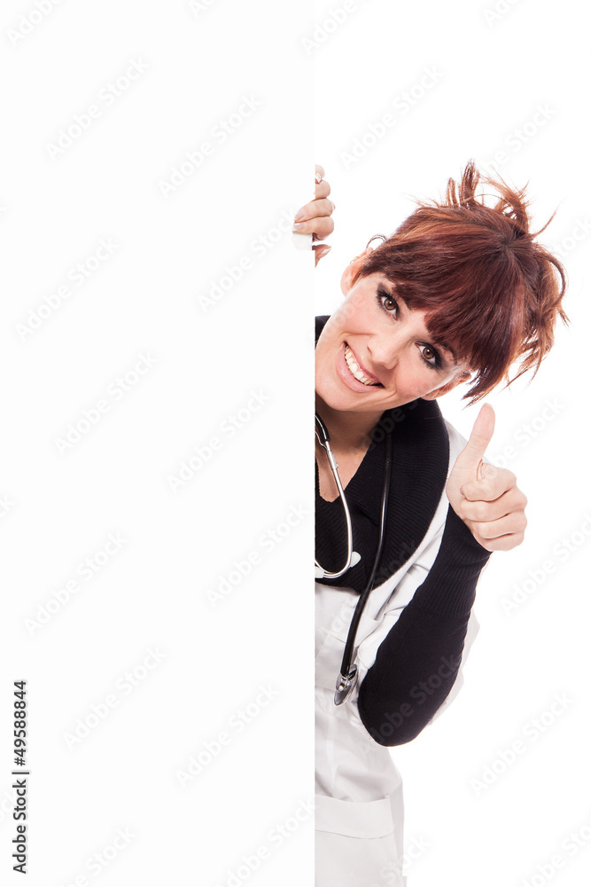 Smiling brunette female doctor with message board Smiling brunette female doctor with message board