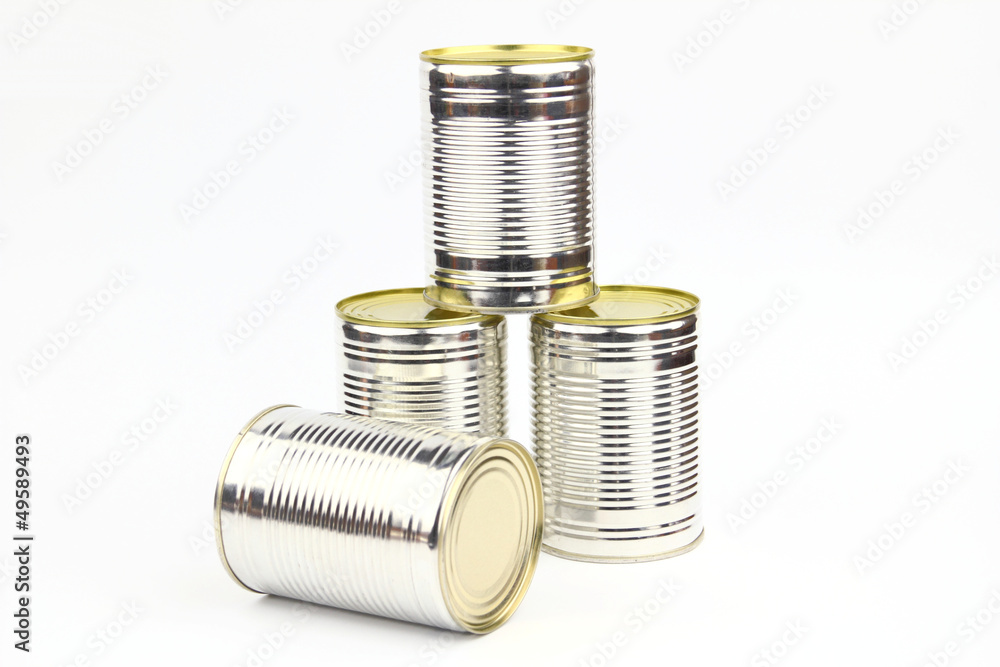 Unopened cans arranged on the white background Unopened cans arranged on the white background