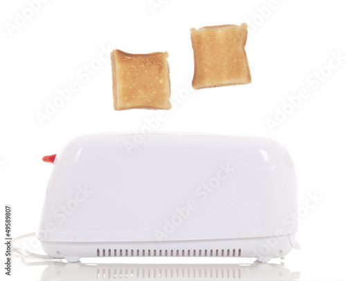 Toast popping out of a toaster