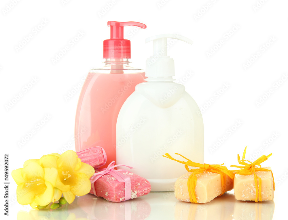Liquid and hand-made soaps isolated on white Liquid and hand-made soaps isolated on white