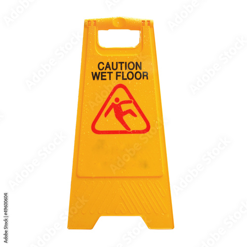 Sign advising caution on wet floor isolated on white