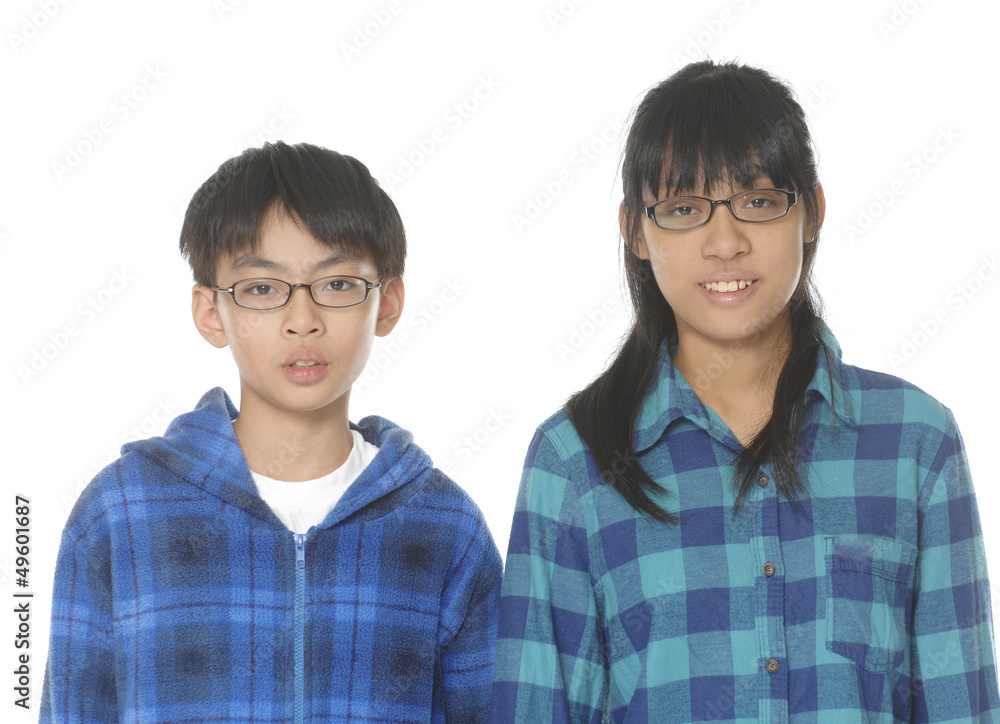 happy brother and sister studio portrait –close up happy brother and sister studio portrait –close up