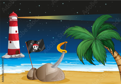 A pirate flag and a sword at the seashore