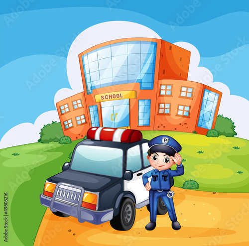 A patrol car and the policeman near the school