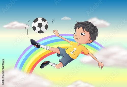 A boy playing soccer