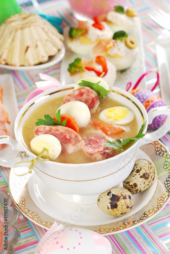 easter white borscht with quail eggs and sausage in a glass