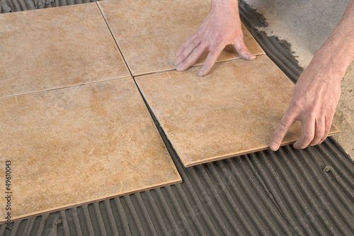 placing a tile floor