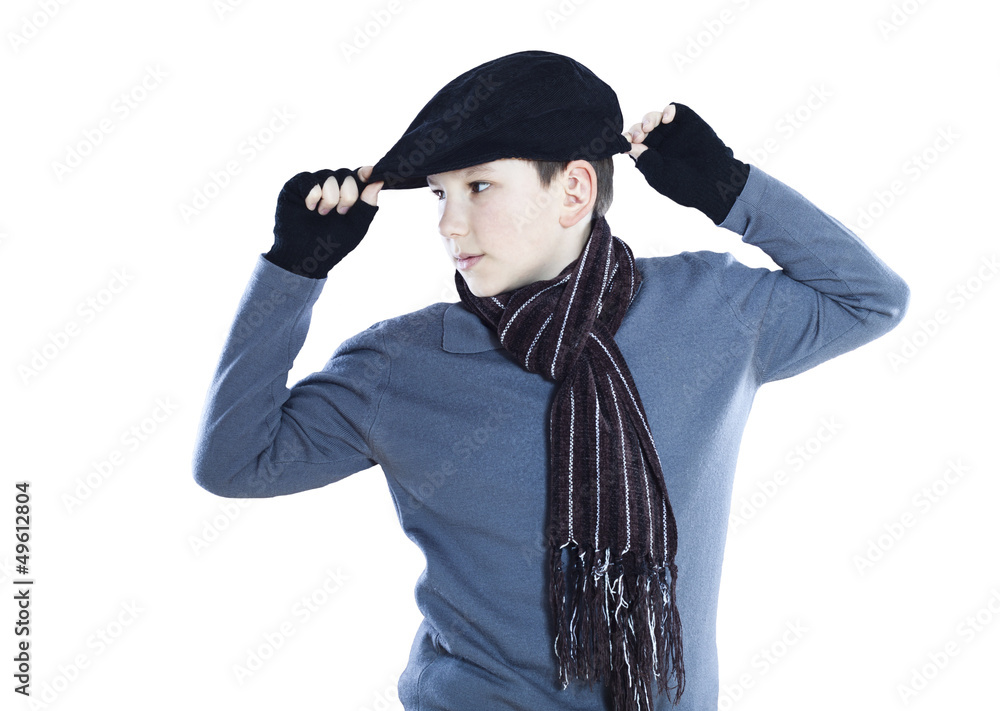 Cute boy holding his hat