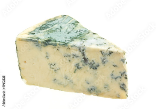 Wedge of soft blue cheese, isolated on white