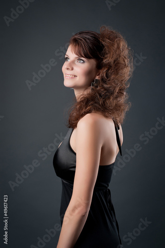 Beautiful woman on a black background