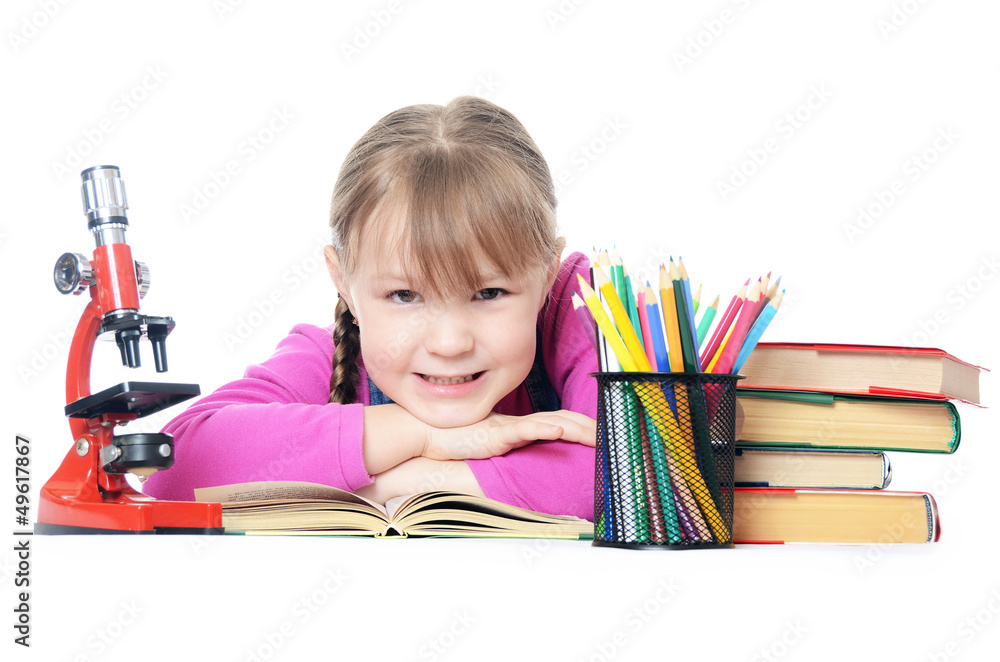 The little girl learn isolated on white background