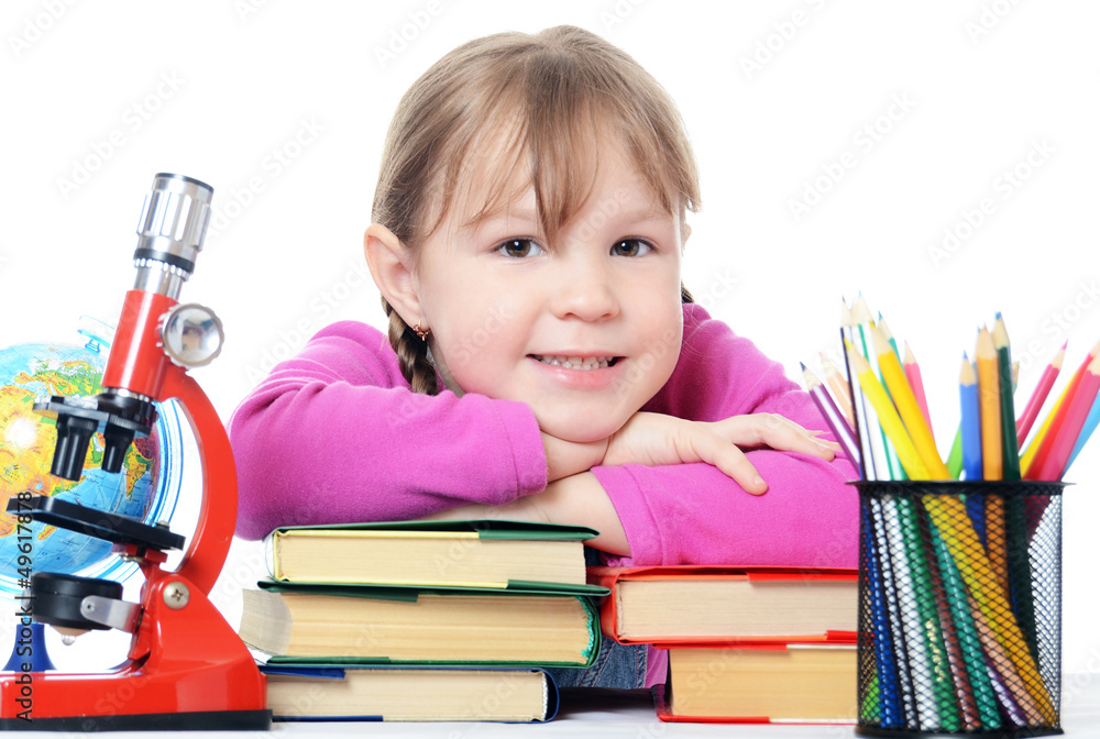 The little girl learn isolated on white background The little girl learn isolated on white background