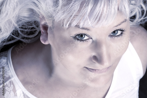 Fototapeta Naklejka Na Ścianę i Meble -  Portrait of a blond woman in middle age