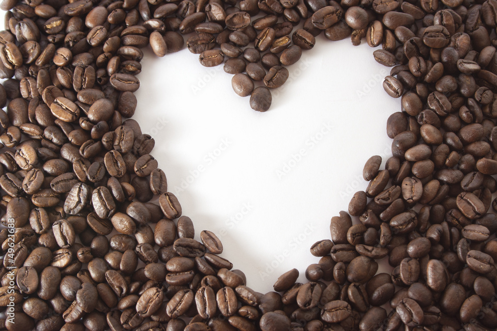 white heart in the frame of coffee beans white heart in the frame of coffee beans