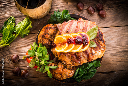 baked turkey with chestnut filling and orange photo