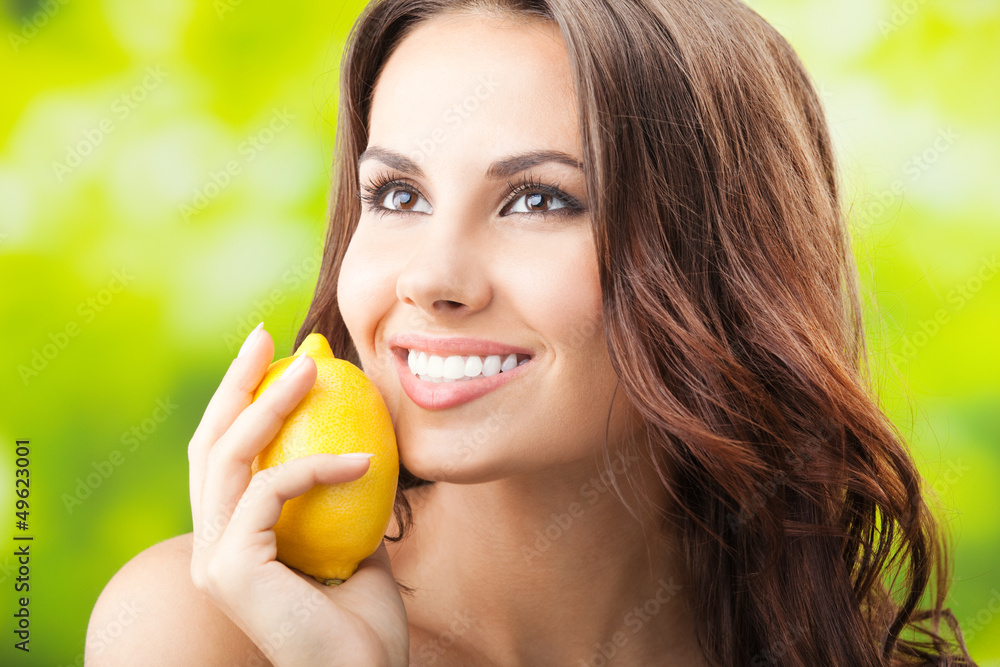 Young happy smiling woman with limon, outdoors Young happy smiling woman with limon, outdoors