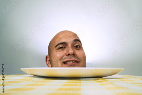 Human head on plate photo