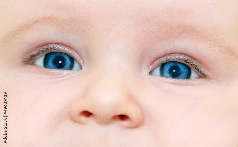 face of nice blue-eyed baby