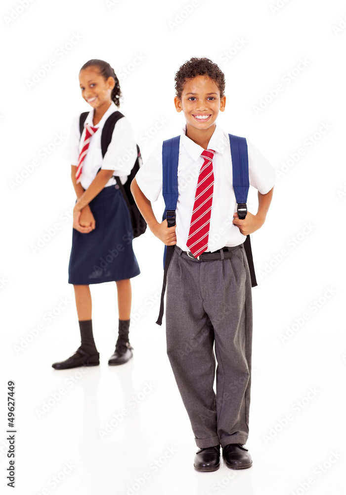 two primary school students standing on white two primary school students standing on white
