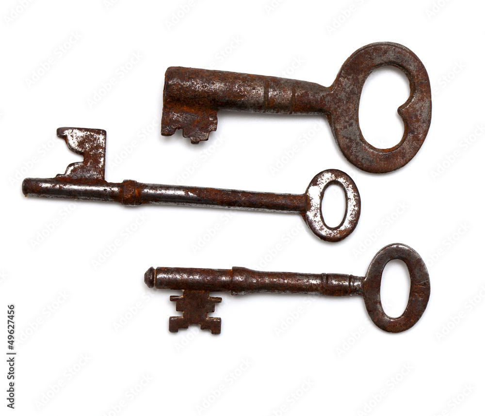 three old keys isolated on white background three old keys isolated on white background