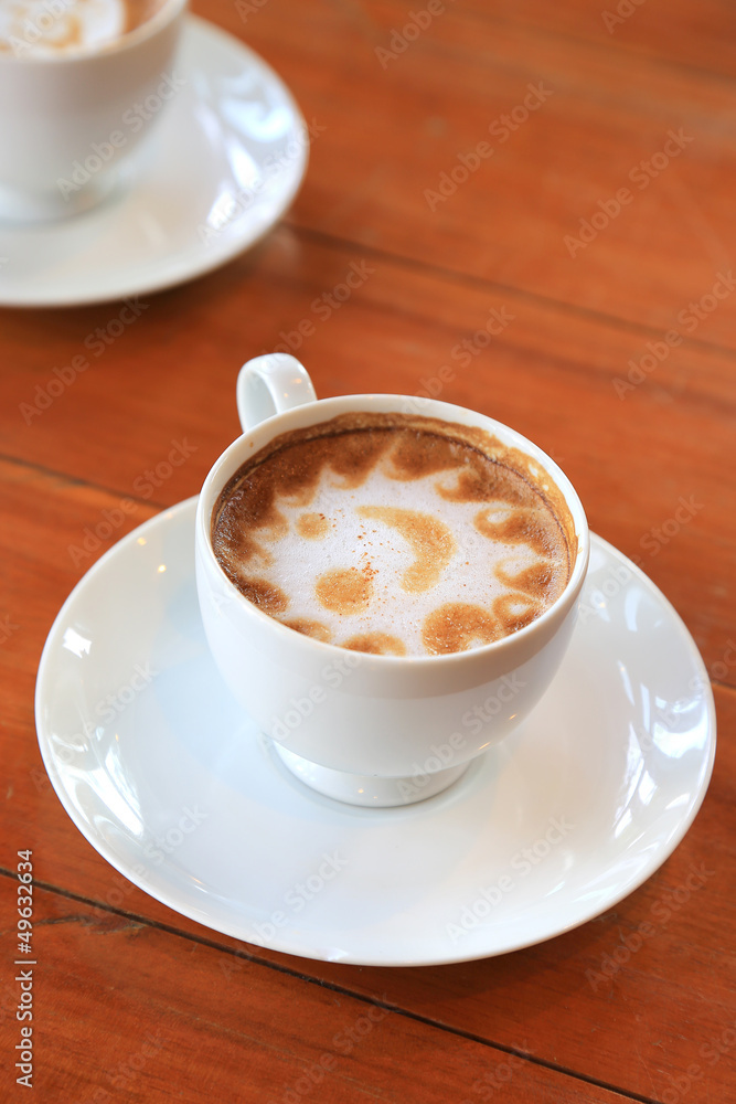 Cup of coffee on wood table Cup of coffee on wood table