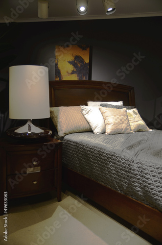 Home interior scene featuring a modern bedroom setting