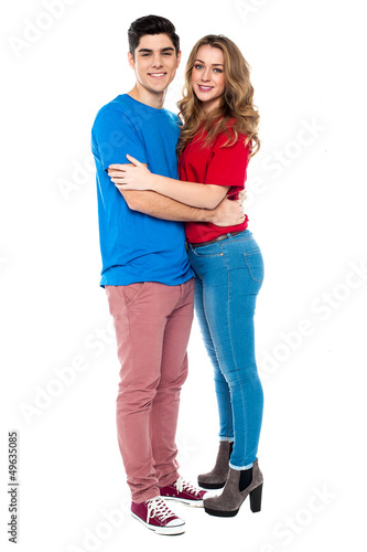 Trendy love couple embracing each other